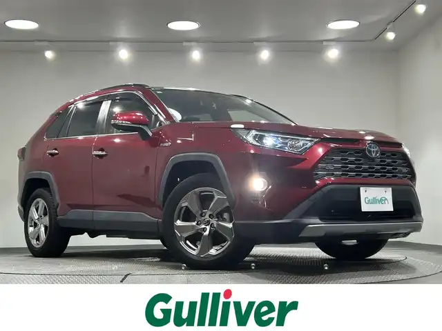 トヨタ ＲＡＶ４ ハイブリッドG 愛知県 2019(令1)年 6万km センシュアルレッドマイカ 純正９インチナビ/サンルーフ/プリクラッシュセーフティ/レーダークルーズコントロール/ブラインドスポットモニター/クリアランスソナー/レーントレーシングアシスト/パワーバックドア/電動パーキングアシスト/ブレーキホールド/レザーシート/パワーシート【メモリー機能付】/シートヒーター/ハンドルヒーター/バックカメラ/デジタルインナーミラー/前後ドライブレコーダー/ビルトインＥＴＣ2.0/アクセサリーソケット/オートハイビーム/LEDヘッドライト/純正フロアマット/純正18インチアルミホイール