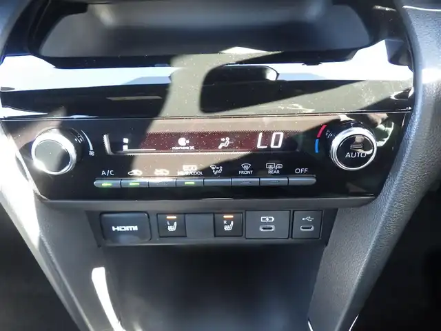 トヨタ ヤリスクロス ハイブリッド Z ウルバーノ 千葉県 2025(令7)年 0.1千km 黒／グレー HYBRID Z　URBANO　ディスプレイオーディオPLUS　BSM　パノラミックビューモニタ（標準装備）/Toyota Safety Sense/・プリクラッシュセーフティ/・レーンディパーチャーアラート/・オートハイビーム/・レーダークルーズコントロール/・ブラインドスポットモニター/純正コネクティッドナビ/地デジTV/【Bluetooth接続】/パノラミックビューモニター/運転席パワーシート/ハーフレザーシート/前席シートヒーター/革巻きステアリング/ステアリングスイッチ/ETC（2.0）/LEDヘッドライト/フォグライト/ウインカーミラー/クリアランスソナー/純正18インチアルミホイル/サイド/カーテンエアバッグ/スマートキー