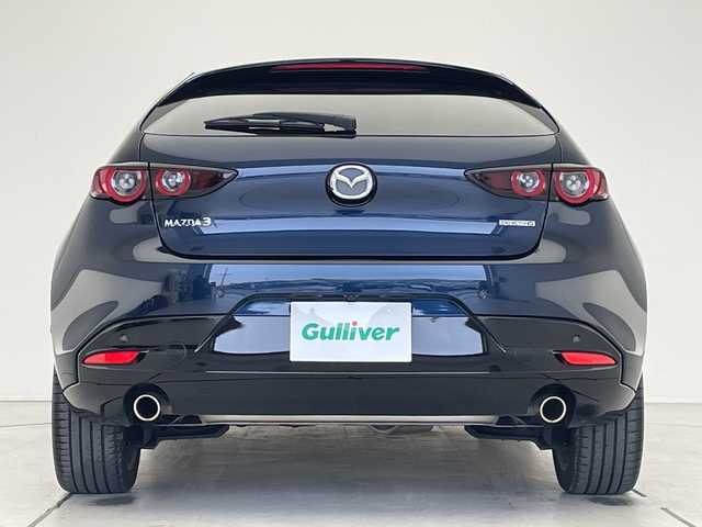 マツダ マツダ３ファストバック 15S ツーリング 愛知県 2020(令2)年 5.8万km ディープクリスタルブルーマイカ 純正9型ナビ/レーダークルーズコントロール/バックカメラ/ヘッドアップディスプレイ/コーナーセンサー/純正アルミホイール/オートマチックハイビーム/ＥＴＣ/ブラインドスポットモニター/LEDヘッドライト/ドライブレコーダー/ステアリングスイッチ/スマートキー/プッシュスタート