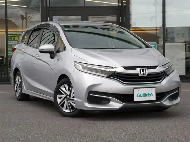 ホンダ シャトル ハイブリッド X 茨城県 2015(平27)年 11.4万km アラバスターシルバーメタリック 純正ナビ/【ラジオ・DISC・USB・iPod・BT・TV・HDMI】/パドルシフト/クルコン/ETC/Bカメラ/前方ドラレコ/ステリモ/スマートキー/プッシュスタート/オートライト/LEDライト/純正フロアマット/純正ホイールカバー/電格ミラー/ウインカーミラー/ドアバイザー