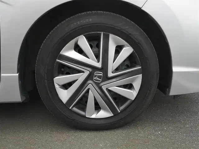 ホンダ シャトル ハイブリッド X 茨城県 2015(平27)年 11.4万km アラバスターシルバーメタリック 純正ナビ/【ラジオ・DISC・USB・iPod・BT・TV・HDMI】/パドルシフト/クルコン/ETC/Bカメラ/前方ドラレコ/ステリモ/スマートキー/プッシュスタート/オートライト/LEDライト/純正フロアマット/純正ホイールカバー/電格ミラー/ウインカーミラー/ドアバイザー