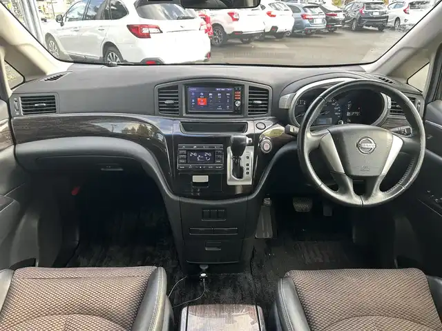 日産 エルグランド 250ハイウェイスター 道北・旭川 2013(平25)年 12.8万km ブリリアントホワイトパール (株)IDOMが運営する【じしゃロン旭川店】の自社ローン専用車両になります。こちらは現金またはオートローンご利用時の価格です。自社ローンご希望の方は別途その旨お申付け下さい/　/・純正ナビ(CD/DVD/BT/SD/フルセグ)/・バックカメラ/・ETC/・ドライブレコーダー/・両側パワースライドドア/・フリップダウンモニター/・電動格納ウィンカーミラー/・プッシュスタート/・スマートキー2個/・フォグランプ/・取扱説明書