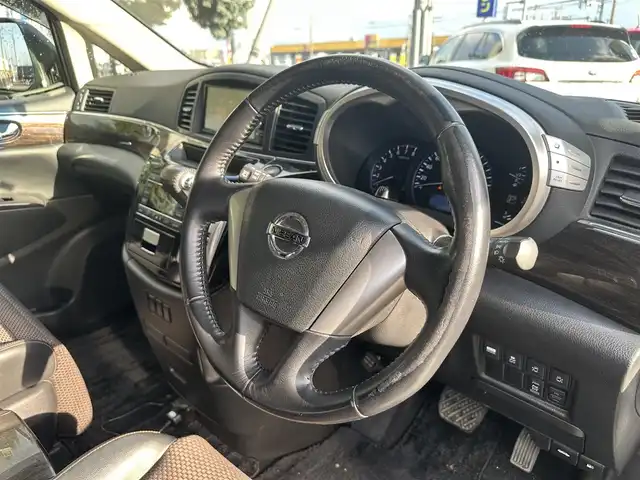 日産 エルグランド 250ハイウェイスター 道北・旭川 2013(平25)年 12.8万km ブリリアントホワイトパール (株)IDOMが運営する【じしゃロン旭川店】の自社ローン専用車両になります。こちらは現金またはオートローンご利用時の価格です。自社ローンご希望の方は別途その旨お申付け下さい/　/・純正ナビ(CD/DVD/BT/SD/フルセグ)/・バックカメラ/・ETC/・ドライブレコーダー/・両側パワースライドドア/・フリップダウンモニター/・電動格納ウィンカーミラー/・プッシュスタート/・スマートキー2個/・フォグランプ/・取扱説明書