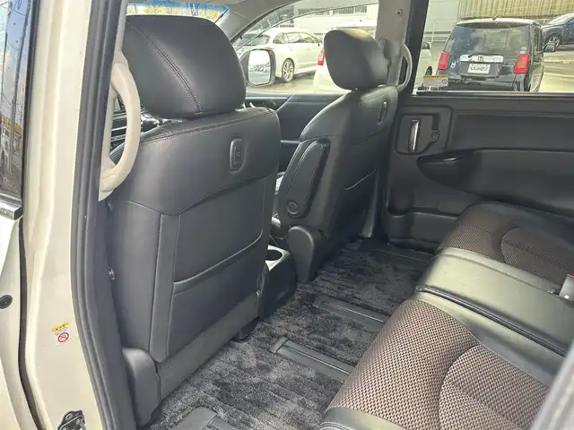 日産 エルグランド 250ハイウェイスター 道北・旭川 2013(平25)年 12.8万km ブリリアントホワイトパール (株)IDOMが運営する【じしゃロン旭川店】の自社ローン専用車両になります。こちらは現金またはオートローンご利用時の価格です。自社ローンご希望の方は別途その旨お申付け下さい/　/・純正ナビ(CD/DVD/BT/SD/フルセグ)/・バックカメラ/・ETC/・ドライブレコーダー/・両側パワースライドドア/・フリップダウンモニター/・電動格納ウィンカーミラー/・プッシュスタート/・スマートキー2個/・フォグランプ/・取扱説明書