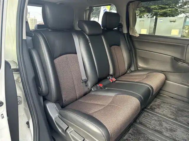 日産 エルグランド 250ハイウェイスター 道北・旭川 2013(平25)年 12.8万km ブリリアントホワイトパール (株)IDOMが運営する【じしゃロン旭川店】の自社ローン専用車両になります。こちらは現金またはオートローンご利用時の価格です。自社ローンご希望の方は別途その旨お申付け下さい/　/・純正ナビ(CD/DVD/BT/SD/フルセグ)/・バックカメラ/・ETC/・ドライブレコーダー/・両側パワースライドドア/・フリップダウンモニター/・電動格納ウィンカーミラー/・プッシュスタート/・スマートキー2個/・フォグランプ/・取扱説明書