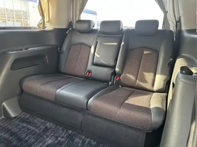 日産 エルグランド 250ハイウェイスター 道北・旭川 2013(平25)年 12.8万km ブリリアントホワイトパール (株)IDOMが運営する【じしゃロン旭川店】の自社ローン専用車両になります。こちらは現金またはオートローンご利用時の価格です。自社ローンご希望の方は別途その旨お申付け下さい/　/・純正ナビ(CD/DVD/BT/SD/フルセグ)/・バックカメラ/・ETC/・ドライブレコーダー/・両側パワースライドドア/・フリップダウンモニター/・電動格納ウィンカーミラー/・プッシュスタート/・スマートキー2個/・フォグランプ/・取扱説明書