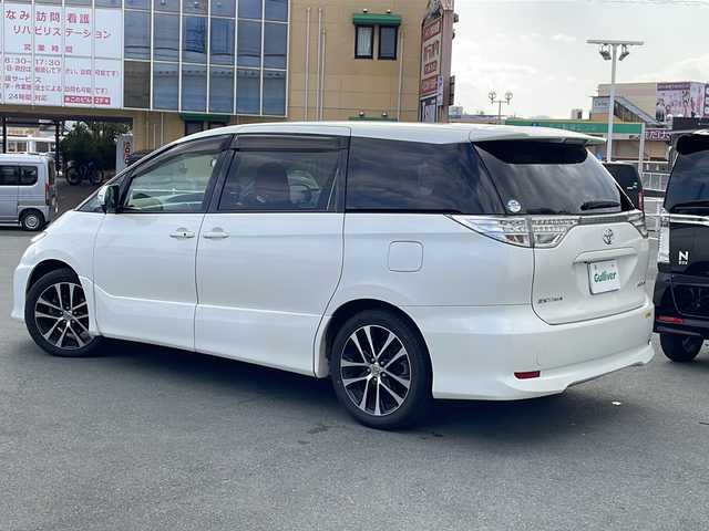 トヨタ エスティマ アエラス 三重県 2013(平25)年 12.5万km ホワイトパールクリスタルシャイン 純正8型ナビ/フルセグTV/CD.DVD再生/Bluetooth/ビルトインETC/純正フリップダウンモニター/HIDヘッドライト/クルーズコントロール/両側パワースライドドア/バックカメラ/ステアリングリモコン/寒冷地仕様/ワイパーデアイサー/電動格納ミラー/オートライト
