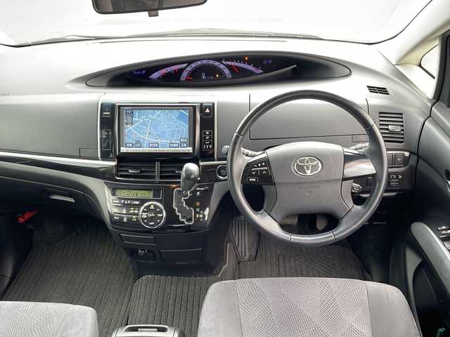 トヨタ エスティマ アエラス 三重県 2013(平25)年 12.5万km ホワイトパールクリスタルシャイン 純正8型ナビ/フルセグTV/CD.DVD再生/Bluetooth/ビルトインETC/純正フリップダウンモニター/HIDヘッドライト/クルーズコントロール/両側パワースライドドア/バックカメラ/ステアリングリモコン/寒冷地仕様/ワイパーデアイサー/電動格納ミラー/オートライト