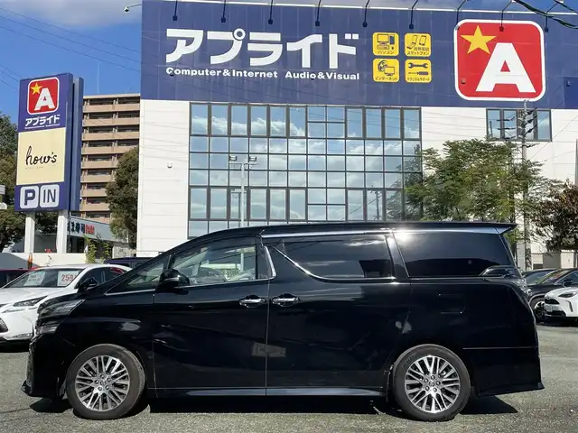 トヨタ ヴェルファイア Z Gエディション 熊本県 2016(平28)年 13.2万km ブラック ワンオーナー/アルパイン製ナビ/（CD・DVD・フルセグTV・BTオーディオ・SD）/バックカメラ/ビルトインETC/アルパイン製フリップダウンモニター（RSA10S-L）/純正18インチAW/クルーズコントロール/両側パワースライドドア/パワーバックドア/ハーフレザーシート/前席パワーシート・右前席シートメモリー/LEDヘッドライト/オートライト/フォグライト/ステアリングヒーター/前後コーナーセンサー/横滑り防止装置/ウィンカーミラー/純正フロアマット/純正ドアバイザー/新車保証書/取扱説明書/スマートスペアキー×1本