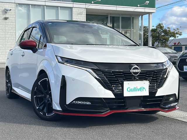 日産 オーラ ニスモ 香川県 2023(令5)年 4.7万km ピュアホワイトパール / スーパーブラック 2トーン 純正メーカーOP9インチワイドディスプレイ（フルセグTV/BT)/アラウンドビューモニター/ブラインドスポットモニター/デジタルインナーミラー/メーカーOPワイヤレス充電/車線逸脱防止支援/ルート減速支援/標識検知支援/ハンドル支援/速度標識表示/制限速度支援/後退時車両検知警報/ふらつき警報/トレースコントロール/パーソナルディスプレイ/プロパイロット/ドライブレコーダー/コーナーセンサー/ビルトインETC2.0/LEDヘッドライト/オートライト/スペアキー