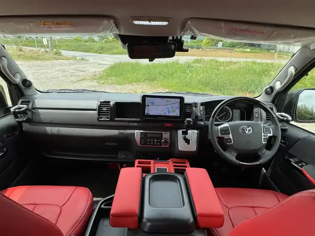 トヨタ ハイエース グランドキャビン 兵庫県 2020(令2)年 1.6万km ホワイトパールクリスタルシャイン S.A.Dデイジーフロントスポイラー/S.A.Dデイジーサイドエアロ/S.A.Dエージェントリアバンパー/S.A.Dリアウィング/社外ワイドフェンダー/カロッツェリア9インチナビ/カロッツェリア13.3インチフリップダウン/ファブレスローダウン/DVD再生・BT接続可/フルセグTV/デジタルインナーミラー/バックカメラ/ファブレスBARONE18インチAW/スマートキー×2×/AUTOハイビーム