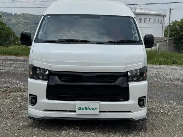 トヨタ ハイエース グランドキャビン 兵庫県 2020(令2)年 1.6万km ホワイトパールクリスタルシャイン S.A.Dデイジーフロントスポイラー/S.A.Dデイジーサイドエアロ/S.A.Dエージェントリアバンパー/S.A.Dリアウィング/社外ワイドフェンダー/カロッツェリア9インチナビ/カロッツェリア13.3インチフリップダウン/ファブレスローダウン/DVD再生・BT接続可/フルセグTV/デジタルインナーミラー/バックカメラ/ファブレスBARONE18インチAW/スマートキー×2×/AUTOハイビーム