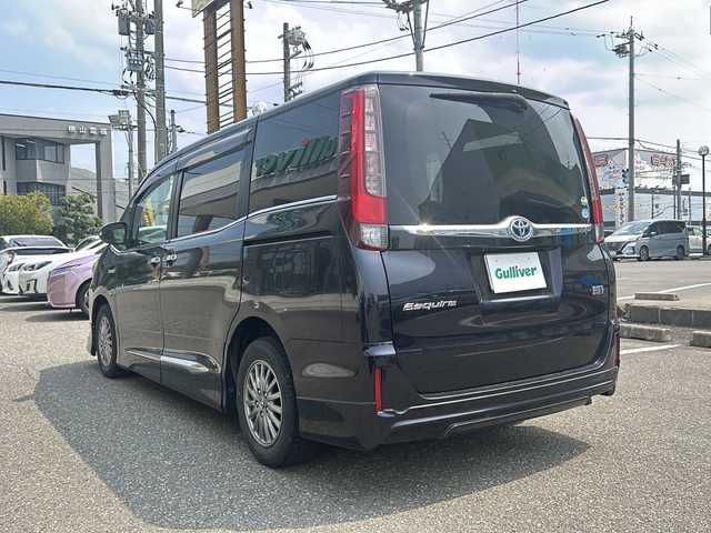 トヨタ エスクァイア ハイブリッド 福井県 2015(平27)年 18.1万km スパークリングブラックパールクリスタルシャイン ワンオーナー/保証書/取扱説明書/スマートキー/プッシュスタート/純正フリップダウンモニター/純正メモリーナビゲーション/ステアリングスイッチ/フルセグテレビ/バックカメラ/両側パワースライドドア/シートヒーター/純正LEDヘッドライト/オートライト/フォグランプ/クルーズコントロール/電動格納ミラー/純正ドアバイザー/純正フロアマット