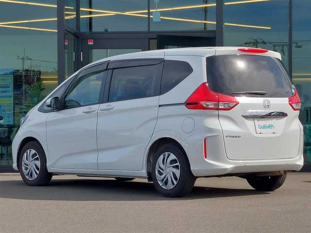 ホンダ フリード G ホンダセンシング 東京都 2020(令2)年 2.9万km プラチナホワイトパール KENWOOD社外ナビ　/・ＦＭ／ＡＭ／ＣＤ／ＤＶＤ/・フルセグＴＶ／Ｂｌｕｅｔｏｏｔｈ　/ホンダセンシング　/両側パワースライドドア　/運転席&助手席シートヒーター/センターテーブル/バックカメラ　/ＥＴＣ　/三列シート/ウォークスルーシート/オートエアコン　/オートライト　/プッシュスタート　/スマートキー