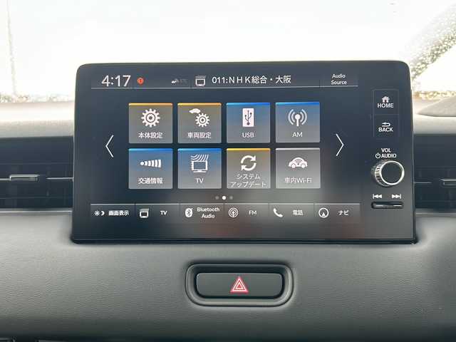 ホンダ ヴェゼル ハイブリッド e:HEV Z 大阪府 2025(令7)年 0.1千km プラチナホワイトパール 純正ナビ　/オプショングリル　/置くだけ充電　/トノカバー　/レーザークルーズコントロール　/電動リアゲート　/電動パーキング　/フルセグ　/ＡｐｐｌｅＣａｒＰｌａｙ　/ＡｎｄｒｏｉｄＡｕｔｏ　/シートヒーター/オートライト