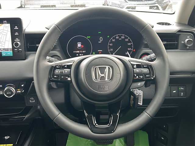 ホンダ ヴェゼル ハイブリッド e:HEV Z 大阪府 2025(令7)年 0.1千km プラチナホワイトパール 純正ナビ　/オプショングリル　/置くだけ充電　/トノカバー　/レーザークルーズコントロール　/電動リアゲート　/電動パーキング　/フルセグ　/ＡｐｐｌｅＣａｒＰｌａｙ　/ＡｎｄｒｏｉｄＡｕｔｏ　/シートヒーター/オートライト