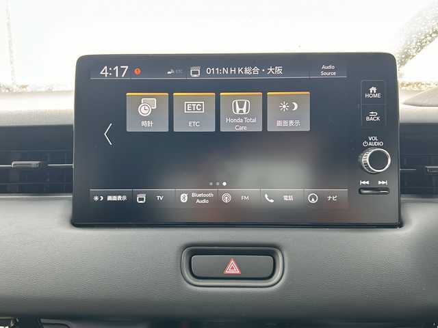 ホンダ ヴェゼル ハイブリッド e:HEV Z 大阪府 2025(令7)年 0.1千km プラチナホワイトパール 純正ナビ　/オプショングリル　/置くだけ充電　/トノカバー　/レーザークルーズコントロール　/電動リアゲート　/電動パーキング　/フルセグ　/ＡｐｐｌｅＣａｒＰｌａｙ　/ＡｎｄｒｏｉｄＡｕｔｏ　/シートヒーター/オートライト