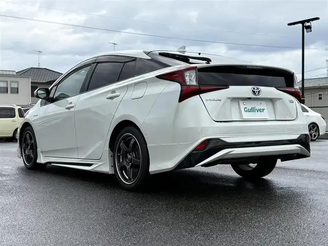 トヨタ プリウス A プレミアム 大分県 2019(平31)年 6.8万km ホワイトパールクリスタルシャイン ・純正9インチナビ/・フルセグテレビ/・バックカメラ/・モデリスタ/・AC100V/・レザーシート/・シートヒーターエアシートD+N/・ETC/・前後コーナーセンサー/・スペアキー/・オートマティックハイビーム/・ヘッドアップディスプレイ/・ワイヤレス充電/・ブラインドスポットモニター/・パワーシート