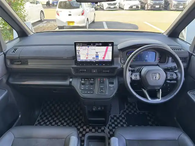 ホンダ ステップワゴン スパーダ eHEV プレミアムライン 千葉県 2024(令6)年 1.5万km トワイライトミストブラックパール ワンオーナー車/ホンダセンシング/衝突軽減ブレーキ/レーダークルーズコントロール/レーンキープアシスト/ブラインドスポットモニター/コーナーセンサー/純正11.4型ナビ/フルセグTV/Bluetooth/CarPlay/全方位カメラ/純正15.6型フリップダウンモニター/両側電動スライドドア/ハーフレザーシート/前席＆2列目シートヒーター/前後ドライブレコーダー/LEDライト/ETC/保証書・取説/スペアキー