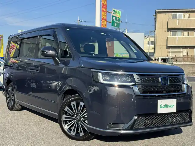 ホンダ ステップワゴン スパーダ eHEV プレミアムライン 千葉県 2024(令6)年 1.5万km トワイライトミストブラックパール ワンオーナー車/ホンダセンシング/衝突軽減ブレーキ/レーダークルーズコントロール/レーンキープアシスト/ブラインドスポットモニター/コーナーセンサー/純正11.4型ナビ/フルセグTV/Bluetooth/CarPlay/全方位カメラ/純正15.6型フリップダウンモニター/両側電動スライドドア/ハーフレザーシート/前席＆2列目シートヒーター/前後ドライブレコーダー/LEDライト/ETC/保証書・取説/スペアキー