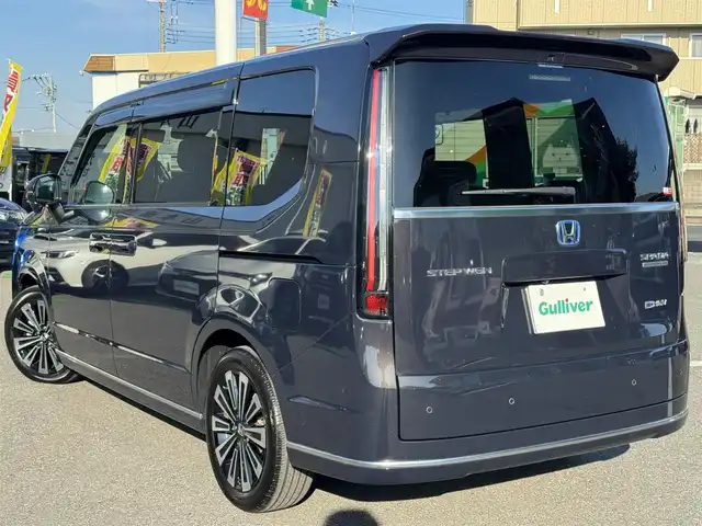 ホンダ ステップワゴン スパーダ eHEV プレミアムライン 千葉県 2024(令6)年 1.5万km トワイライトミストブラックパール ワンオーナー車/ホンダセンシング/衝突軽減ブレーキ/レーダークルーズコントロール/レーンキープアシスト/ブラインドスポットモニター/コーナーセンサー/純正11.4型ナビ/フルセグTV/Bluetooth/CarPlay/全方位カメラ/純正15.6型フリップダウンモニター/両側電動スライドドア/ハーフレザーシート/前席＆2列目シートヒーター/前後ドライブレコーダー/LEDライト/ETC/保証書・取説/スペアキー