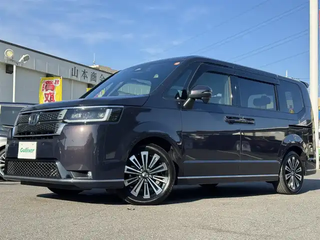 ホンダ ステップワゴン スパーダ eHEV プレミアムライン 千葉県 2024(令6)年 1.5万km トワイライトミストブラックパール ワンオーナー車/ホンダセンシング/衝突軽減ブレーキ/レーダークルーズコントロール/レーンキープアシスト/ブラインドスポットモニター/コーナーセンサー/純正11.4型ナビ/フルセグTV/Bluetooth/CarPlay/全方位カメラ/純正15.6型フリップダウンモニター/両側電動スライドドア/ハーフレザーシート/前席＆2列目シートヒーター/前後ドライブレコーダー/LEDライト/ETC/保証書・取説/スペアキー