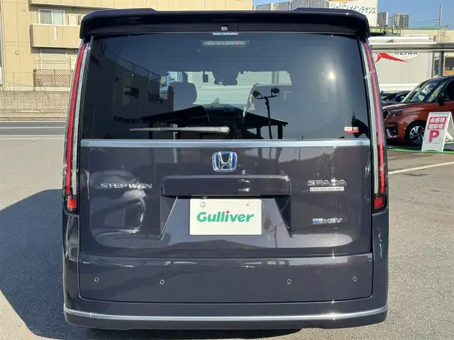 ホンダ ステップワゴン スパーダ eHEV プレミアムライン 千葉県 2024(令6)年 1.5万km トワイライトミストブラックパール ワンオーナー車/ホンダセンシング/衝突軽減ブレーキ/レーダークルーズコントロール/レーンキープアシスト/ブラインドスポットモニター/コーナーセンサー/純正11.4型ナビ/フルセグTV/Bluetooth/CarPlay/全方位カメラ/純正15.6型フリップダウンモニター/両側電動スライドドア/ハーフレザーシート/前席＆2列目シートヒーター/前後ドライブレコーダー/LEDライト/ETC/保証書・取説/スペアキー