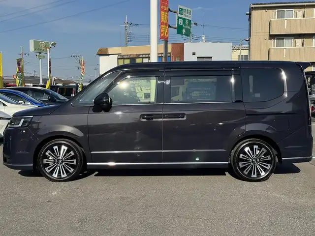 ホンダ ステップワゴン スパーダ eHEV プレミアムライン 千葉県 2024(令6)年 1.5万km トワイライトミストブラックパール ワンオーナー車/ホンダセンシング/衝突軽減ブレーキ/レーダークルーズコントロール/レーンキープアシスト/ブラインドスポットモニター/コーナーセンサー/純正11.4型ナビ/フルセグTV/Bluetooth/CarPlay/全方位カメラ/純正15.6型フリップダウンモニター/両側電動スライドドア/ハーフレザーシート/前席＆2列目シートヒーター/前後ドライブレコーダー/LEDライト/ETC/保証書・取説/スペアキー