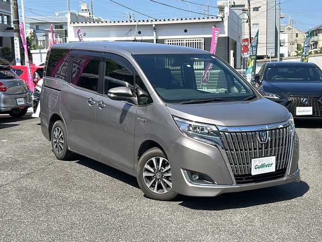 トヨタ エスクァイア ハイブリッド Gi 愛知県 2018(平30)年 5.4万km アバンギャルドブロンズメタリック /禁煙車/ワンオーナー//純正9インチSDナビ・フルセグTV//バックカメラ/ビルトインETC//純正ドライブレコーダー（ナビ連携）//トヨタセーフティセンス//プリクラッシュセーフティ//レーンディパーチャーアラート//クルーズコントロール//両側パワースライドドア//黒合皮革シート//D/N席シートヒーター//プッシュスタート//LEDオートライト//純正１６インチアルミ//オートマチックハイビーム//純正フロアマット//純正ドアバイザー//電動格納ミラーウインカー//ステアリングスイッチ//リアサンシェード//新車保証書//スペアキー