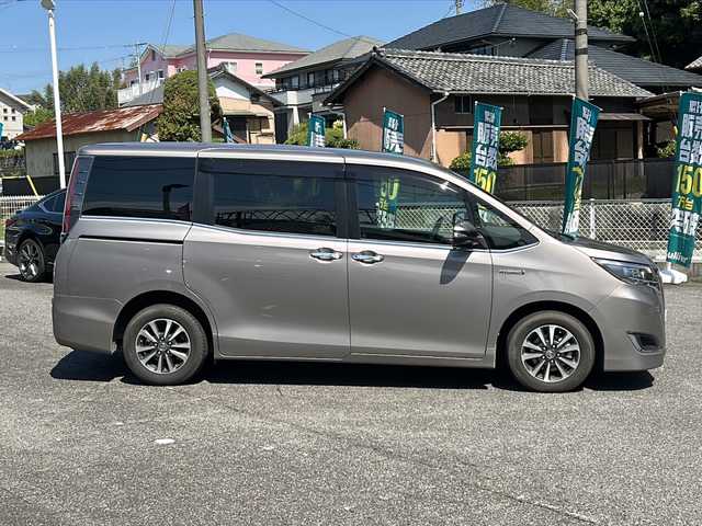トヨタ エスクァイア ハイブリッド Gi 愛知県 2018(平30)年 5.4万km アバンギャルドブロンズメタリック /禁煙車/ワンオーナー//純正9インチSDナビ・フルセグTV//バックカメラ/ビルトインETC//純正ドライブレコーダー（ナビ連携）//トヨタセーフティセンス//プリクラッシュセーフティ//レーンディパーチャーアラート//クルーズコントロール//両側パワースライドドア//黒合皮革シート//D/N席シートヒーター//プッシュスタート//LEDオートライト//純正１６インチアルミ//オートマチックハイビーム//純正フロアマット//純正ドアバイザー//電動格納ミラーウインカー//ステアリングスイッチ//リアサンシェード//新車保証書//スペアキー