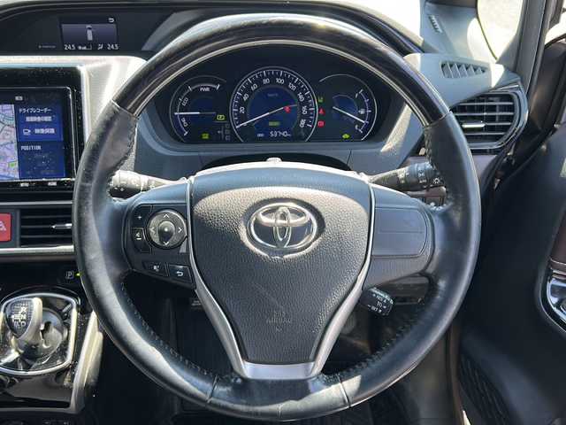 トヨタ エスクァイア ハイブリッド Gi 愛知県 2018(平30)年 5.4万km アバンギャルドブロンズメタリック /禁煙車/ワンオーナー//純正9インチSDナビ・フルセグTV//バックカメラ/ビルトインETC//純正ドライブレコーダー（ナビ連携）//トヨタセーフティセンス//プリクラッシュセーフティ//レーンディパーチャーアラート//クルーズコントロール//両側パワースライドドア//黒合皮革シート//D/N席シートヒーター//プッシュスタート//LEDオートライト//純正１６インチアルミ//オートマチックハイビーム//純正フロアマット//純正ドアバイザー//電動格納ミラーウインカー//ステアリングスイッチ//リアサンシェード//新車保証書//スペアキー