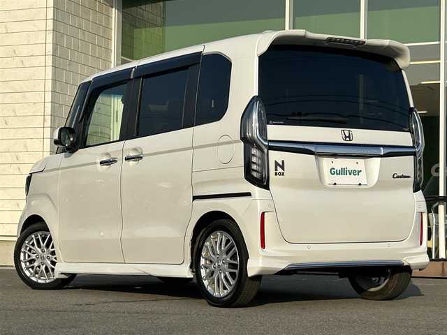 ホンダ Ｎ ＢＯＸ カスタム L ターボ 兵庫県 2021(令3)年 3.1万km プラチナホワイトパール 純正8インチナビ/パドルシフト/クルーズコントロール/ビルトインETC/前席シートヒーター/前後ドライブレコーダー/バックカメラ/コーナーセンサー/両側パワースライドドア/プリクラッシュ/フルセグTV/純正フロアマット/LEDヘッドライト