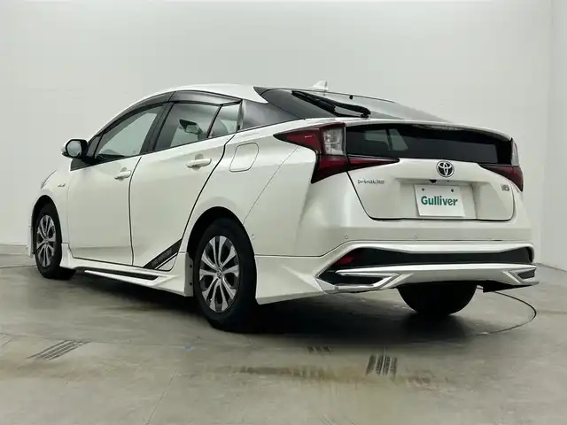 トヨタ プリウス A プレミアム 岡山県 2019(平31)年 7.2万km ホワイトパールクリスタルシャイン モデリスタエアロ/純正9インチナビ/・FM/AM/Bluetooth/フルセグ/CD/DVD/バックカメラ/合皮シート/・パワーシート/・ベンチレーション/アクセサリーコンセント/パーキングアシスト/ビルトインETC/ドライブレコーダー/トヨタセーフティーセンス/・プリクラッシュセーフティ/・レーンキープアシスト/・コーナーセンサー/・レーダークルーズコントロール/・オートマチックハイビーム/HUD/LEDヘッドライト/・フォグライト/純正フロアマット