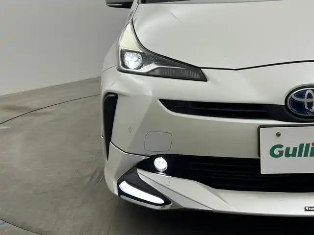 トヨタ プリウス A プレミアム 岡山県 2019(平31)年 7.2万km ホワイトパールクリスタルシャイン モデリスタエアロ/純正9インチナビ/・FM/AM/Bluetooth/フルセグ/CD/DVD/バックカメラ/合皮シート/・パワーシート/・ベンチレーション/アクセサリーコンセント/パーキングアシスト/ビルトインETC/ドライブレコーダー/トヨタセーフティーセンス/・プリクラッシュセーフティ/・レーンキープアシスト/・コーナーセンサー/・レーダークルーズコントロール/・オートマチックハイビーム/HUD/LEDヘッドライト/・フォグライト/純正フロアマット