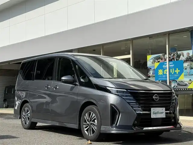 日産 セレナ e－パワー ハイウェイスター V 長崎県 2023(令5)年 1.6万km ダークメタルグレー 登録時15771km/純正ナビ　/・TV/・Bluetoothaudio/・HDMI/スライドドア/ハンズフリースライドドア/D+N席シートヒーター/ステアリングヒーター/デジタルインナーミラー/前後ドライブレコーダー/プロパイロット/フロントダイナミックPK/全方位カメラ/ビルトインETC2.0/両側パワーG/ワイヤレス充電/ブラインドスポットモニター/フリップダウンモニター