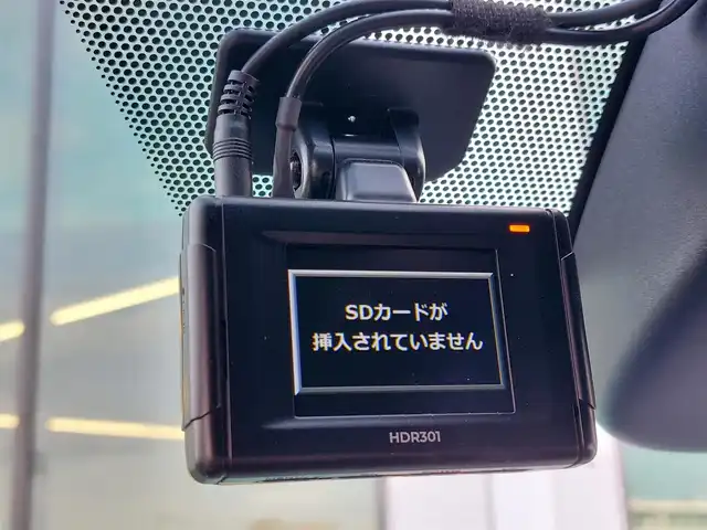 トヨタ ヴォクシー ハイブリッド S－Z 東京都 2025(令7)年 0.4万km アティチュードブラックマイカ 快適利便パッケージ（High）/・ハンズフリーデュアルパワースライドドア/・パワーバックドア/・「ナノイーX」/・ステアリングヒーター/・2列目キャプテンシート・シートヒーター・オットマン/Toyota Safety Sense/・プリクラッシュセーフティ/・レーントレーシングアシスト/・レーンチェンジアシスト/・先行車発進告知機能/・オートマチックハイビーム/・レーダークルーズコントロール/・クリアランスソナー/・パーキングサポートブレーキ/・ロードサインアシスト/パノラミックビューモニター/アドバンスドパーク/プッシュスタート/純正ナビ/　・フルセグTV/　・Bluetooth接続/　・HDMI/　・AM/FMラジオ/純正フリップダウンモニター/前後ドライブレコーダー〔HDR301〕/ビルトインETC2.0/LEDヘッドライト/17インチ純正アルミホイール/スマートキー