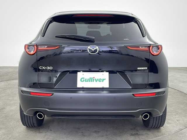 マツダ ＣＸ－３０ 20S Lパッケージ 兵庫県 2021(令3)年 3.3万km ジェットブラックマイカ ・純正10.25インチナビ＆BT＆フルセグ＆CD＆DVD＆HDMI/・レザーシート/・シートヒーター/・パーキングアシスト/・スマートブレーキサポート/・パワーシート/・シートメモリー/・ブラインドスポットモニター/・レーンキープアシスト/・レーダークルーズコントロール/・パドルシフト/・パワーバックドア/・バックカメラ/・LEDヘッドライト/・ETC/・アイドリングストップ/・前後ドライブレコーダー/・純正18インチAW/・電動パーキング/・プッシュスタート