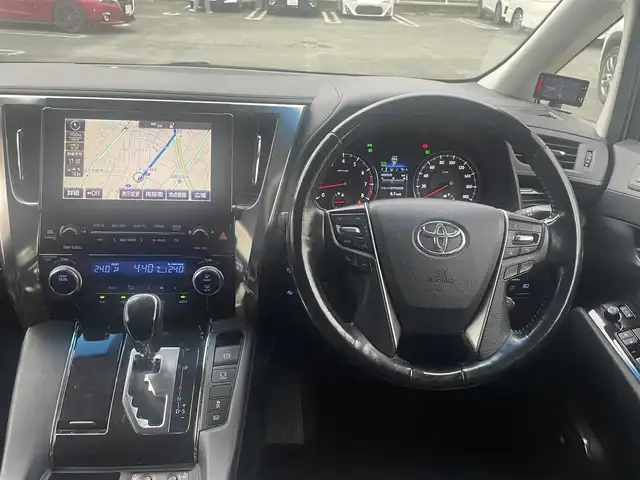 トヨタ ヴェルファイア ZA Gエディション 熊本県 2017(平29)年 7.4万km ホワイトパールクリスタルシャイン 革シート/プッシュスタート/純正ナビ/（CD・DVD・フルセグTV・BTオーディオ・SD）/JBLサウンド/バックカメラ/ビルトインETC/ドライブレコーダー/社外レーダー/純正18インチAW/レーダークルーズ/両側パワースライドドア/パワーバックドア/前席パワーシート・右前席シートメモリー/前席シートヒーター/ステアリングヒーター/LEDヘッドライト/オートライト/フォグライト/前後コーナーセンサー/横滑り防止装置/ウィンカーミラー/純正フロアマット/純正ドアバイザー/新車保証書/取扱説明書/スマートスペアキー×2本