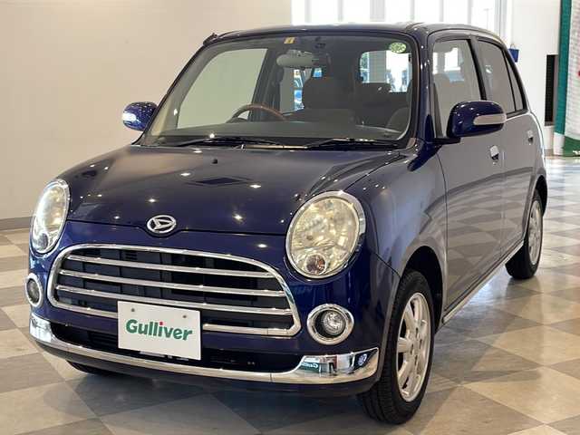 ダイハツ ミラ ジーノ プレミアムL 福井県 2008(平20)年 9.6万km プレシャスブルーマイカメタリック クラリオン6.2インチメモリーナビ(NX513)/ワンセグTV/BT/CD/DVD/USB/SD/AUX/ETC/前後ドライブレコーダー/momoウッドコンビハンドル/純正14アルミホイール/純正フロアマット/フォグランプ/ヘッドライトレベライザー/リモコンキー/スペアキー