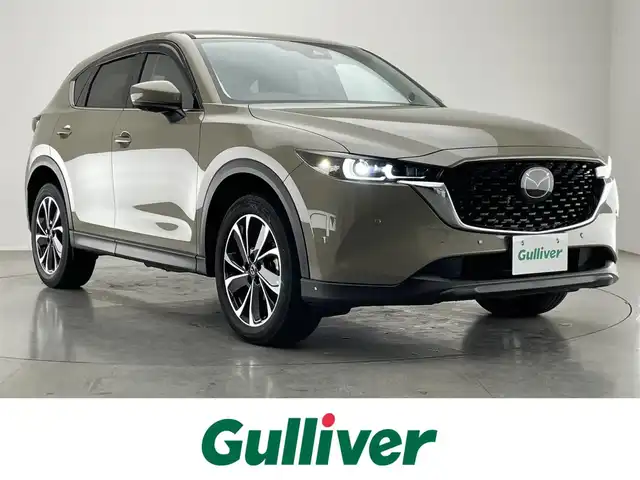 マツダ ＣＸ－５ XD Lパッケージ 愛知県 2022(令4)年 2.1万km ジルコンサンドメタリック 純正１０．２５型ナビ　フルセグＴＶ　Bluetooth　全方位カメラ　禁煙　黒革　シートヒーター　ハンドルヒーター　ＢＯＳＥサウンド　ワイヤレス充電　ＢＳＭ　ＨＵＤ　衝突軽減　追従クルコン　パワーシート　パワーバックドア　ＥＴＣ　/・地上デジタルＴＶチューナー（フルセグ）/・クルージング＆トラフィック・サポート、ワイヤレス充電（Ｑｉ）/・ボーズサウンドシステム（ＡＵＤＩＯＰＩＬＯＴ２＋Ｃｅｎｔｅｒｐｏｉｎｔ２）＋１０スピーカー