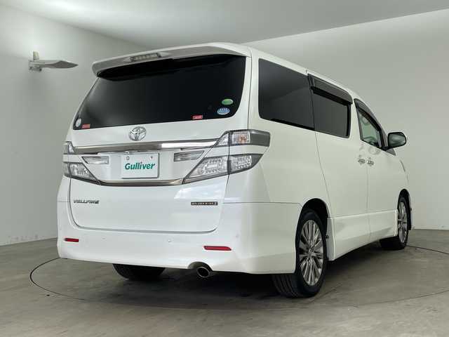 トヨタ ヴェルファイア 2．4Z ゴールデンアイズⅡ 兵庫県 2014(平26)年 9.2万km ホワイトパールクリスタルシャイン ・アルパイン製9インチナビ＆フルセグ＆BT＆DVD/・バックカメラ/・アルパイン製フリップダウンモニター/・両側パワースライドドア/・コーナーセンサー/・ハーフレザーシート/・純正18インチアルミホイール/・スマートキー/・スペアキー/・プッシュスタート/・フロアマット/・2列目オットマン/・カロッツェリア製スピーカー/・パワーバックドア/・電動格納ミラー/・LEDヘッドライト/・オートライト