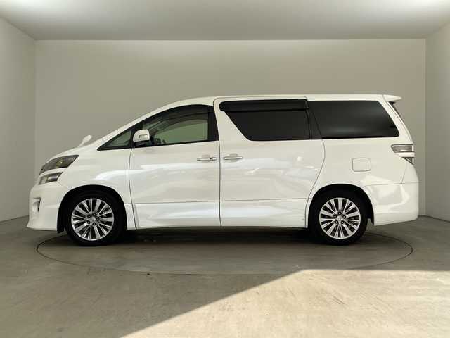 トヨタ ヴェルファイア 2．4Z ゴールデンアイズⅡ 兵庫県 2014(平26)年 9.2万km ホワイトパールクリスタルシャイン ・アルパイン製9インチナビ＆フルセグ＆BT＆DVD/・バックカメラ/・アルパイン製フリップダウンモニター/・両側パワースライドドア/・コーナーセンサー/・ハーフレザーシート/・純正18インチアルミホイール/・スマートキー/・スペアキー/・プッシュスタート/・フロアマット/・2列目オットマン/・カロッツェリア製スピーカー/・パワーバックドア/・電動格納ミラー/・LEDヘッドライト/・オートライト