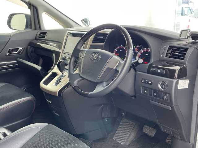 トヨタ ヴェルファイア 2．4Z ゴールデンアイズⅡ 兵庫県 2014(平26)年 9.2万km ホワイトパールクリスタルシャイン ・アルパイン製9インチナビ＆フルセグ＆BT＆DVD/・バックカメラ/・アルパイン製フリップダウンモニター/・両側パワースライドドア/・コーナーセンサー/・ハーフレザーシート/・純正18インチアルミホイール/・スマートキー/・スペアキー/・プッシュスタート/・フロアマット/・2列目オットマン/・カロッツェリア製スピーカー/・パワーバックドア/・電動格納ミラー/・LEDヘッドライト/・オートライト