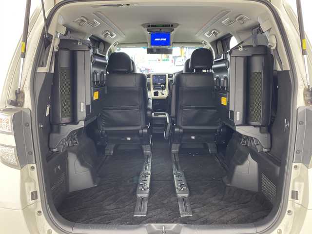 トヨタ ヴェルファイア 2．4Z ゴールデンアイズⅡ 兵庫県 2014(平26)年 9.2万km ホワイトパールクリスタルシャイン ・アルパイン製9インチナビ＆フルセグ＆BT＆DVD/・バックカメラ/・アルパイン製フリップダウンモニター/・両側パワースライドドア/・コーナーセンサー/・ハーフレザーシート/・純正18インチアルミホイール/・スマートキー/・スペアキー/・プッシュスタート/・フロアマット/・2列目オットマン/・カロッツェリア製スピーカー/・パワーバックドア/・電動格納ミラー/・LEDヘッドライト/・オートライト