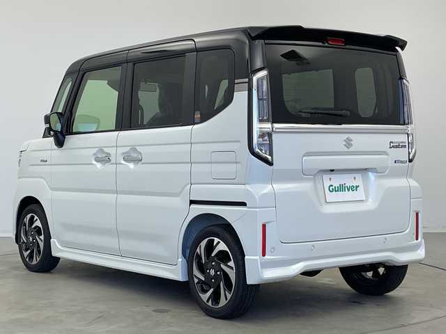 スズキ スペーシア カスタム HYBRID XS 新潟県 2025(令7)年 0.1千km ピュアホワイトパール/ブラック2トーン 4WD/禁煙車/スズキコネクトナビ/（BT/FM/AM/フルセグTV)/全周囲カメラ/ステアリングスイッチ/ステアリングヒーター/ハーフレザーシート/シートヒーター/両側パワースライドドア/ヘッドアップディスプレイ/電格ミラー/ウィンカーミラー/ヘッドライトレベライザー/取扱説明書/保証書/点検記録簿