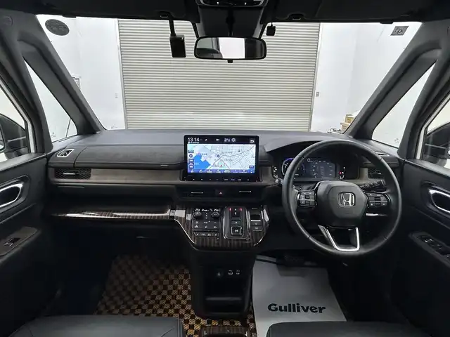 ホンダ ステップワゴン スパーダ eHEV プレミアムライン 岡山県 2023(令5)年 0.8万km プラチナホワイトパール 無限フルエアロ（F/S/RF)/無限18インチAW/無限フロントグリル/無限ドアミラーカバー/純正１１．４インチナビ/（Bluetooth/CD/DVD/フルセグTV）/ハーフレザー/衝突軽減ブレーキ/レーダークルーズコントロール/アラウンドビューモニター/ビルトインＥＴＣ２．０/ＬＥＤヘッドライト/オートハイビーム/フォグランプ/シートヒーター/ブラインドスポットモニター/純正ドライブレコーダー（前後）/パドルシフト/USB接続/フロアマット/両側パワースライドドア