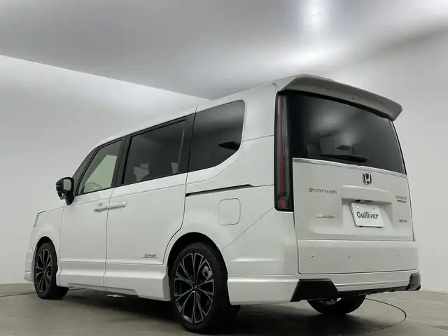 ホンダ ステップワゴン スパーダ eHEV プレミアムライン 岡山県 2023(令5)年 0.8万km プラチナホワイトパール 無限フルエアロ（F/S/RF)/無限18インチAW/無限フロントグリル/無限ドアミラーカバー/純正１１．４インチナビ/（Bluetooth/CD/DVD/フルセグTV）/ハーフレザー/衝突軽減ブレーキ/レーダークルーズコントロール/アラウンドビューモニター/ビルトインＥＴＣ２．０/ＬＥＤヘッドライト/オートハイビーム/フォグランプ/シートヒーター/ブラインドスポットモニター/純正ドライブレコーダー（前後）/パドルシフト/USB接続/フロアマット/両側パワースライドドア