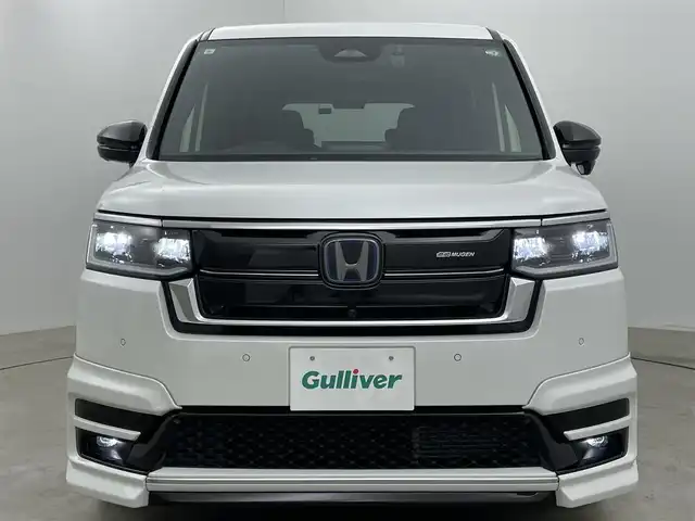 ホンダ ステップワゴン スパーダ eHEV プレミアムライン 岡山県 2023(令5)年 0.8万km プラチナホワイトパール 無限フルエアロ（F/S/RF)/無限18インチAW/無限フロントグリル/無限ドアミラーカバー/純正１１．４インチナビ/（Bluetooth/CD/DVD/フルセグTV）/ハーフレザー/衝突軽減ブレーキ/レーダークルーズコントロール/アラウンドビューモニター/ビルトインＥＴＣ２．０/ＬＥＤヘッドライト/オートハイビーム/フォグランプ/シートヒーター/ブラインドスポットモニター/純正ドライブレコーダー（前後）/パドルシフト/USB接続/フロアマット/両側パワースライドドア