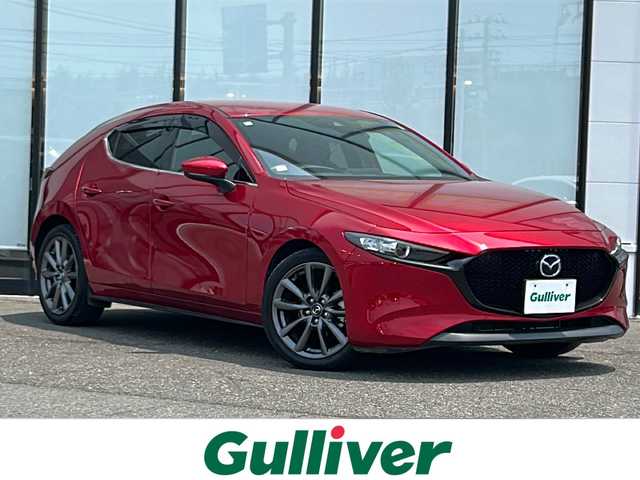 マツダ マツダ３ファストバック 15S ツーリング 山形県 2020(令2)年 3.5万km ソウルレッドクリスタルM ・ディーラー点検記録簿/6か月点検：R3年/12か月点検R4/R5/・ワンオーナー/・純正ナビ（BT/USB/DISC/TV/HDMI）/・BSM/・フルセグテレビ/・全周囲モニター/・ヘッドアップディスプレイ/・純正前後ドライブレコーダー/・ETC/・ステアリングスイッチ/・革巻きステアリング/・レーダークルーズコントロール/・アイドリングストップ/・横滑り防止装置/・純正フロアマット/・電子パーキング/・オートブレーキホールド/・プッシュスタート/・スマートキー/・オートワイパー/・オートライト/・LEDヘッドライト/・電動格納ミラー/・コーナーセンサー/・純正18インチアルミホイール/・ドアバイザー/・保証書/・取説