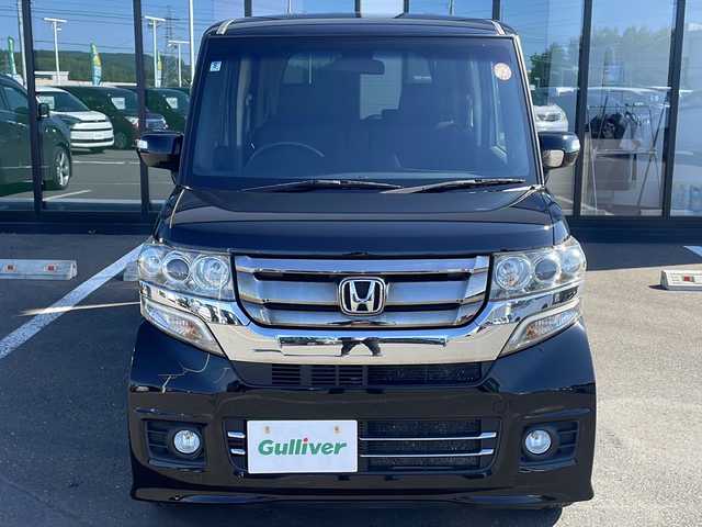 ホンダ Ｎ ＢＯＸ カスタム G Lパッケージ 道東・釧路十勝 2016(平28)年 5.2万km 黒 ・４WD/・純正SDメモリナビ/（CD・DVD・AM・FM・ワンセグ・BT）/・バックカメラ/・純正エンジンスターター/・スマートキー/・プッシュスタート/・HIDヘッドライト/・オートライト/・フォグライト/・ヒーテッドドアミラー/・ビルトインＥＴＣ/・前席シートヒーター/・ステアリングスイッチ/・ドアバイザー/・電動格納ウィンカー
